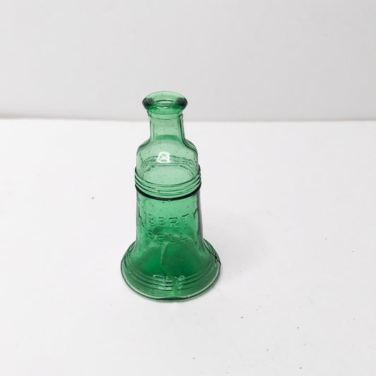 Vintage Liberty Bell green glass bottle 3in.