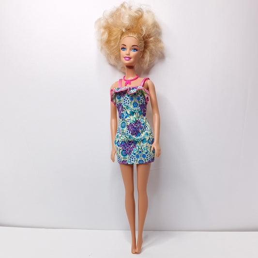 Barbie Doll -Mattel - Redressed-blue eyes . Blue and purple dress