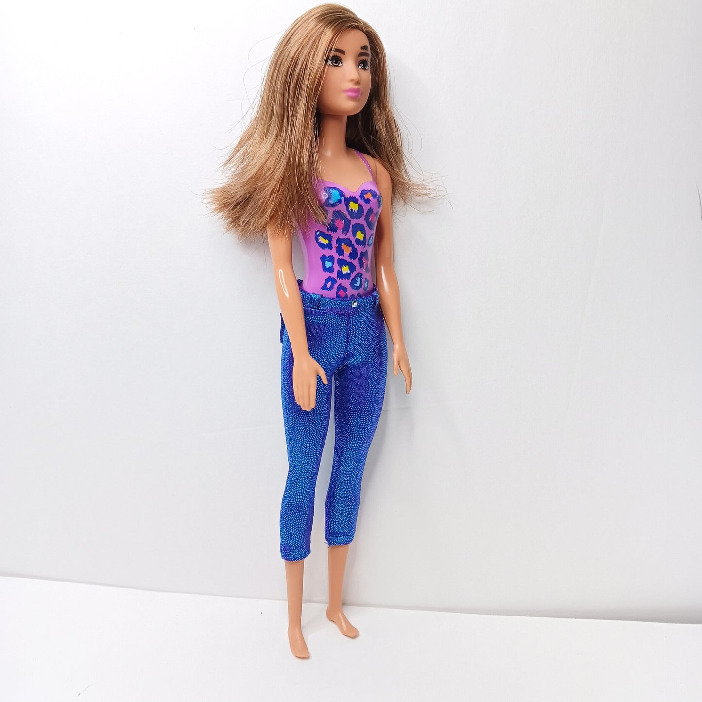 BARBIE DOLL- LONG BROWN HAIR WEARING PURPLE MOLDED-ON SWIMSUIT