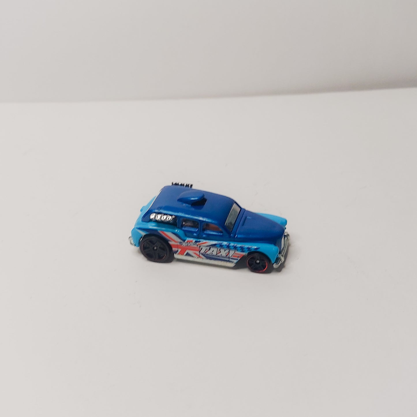 2015 Hot Wheels Cockney Cab II blue