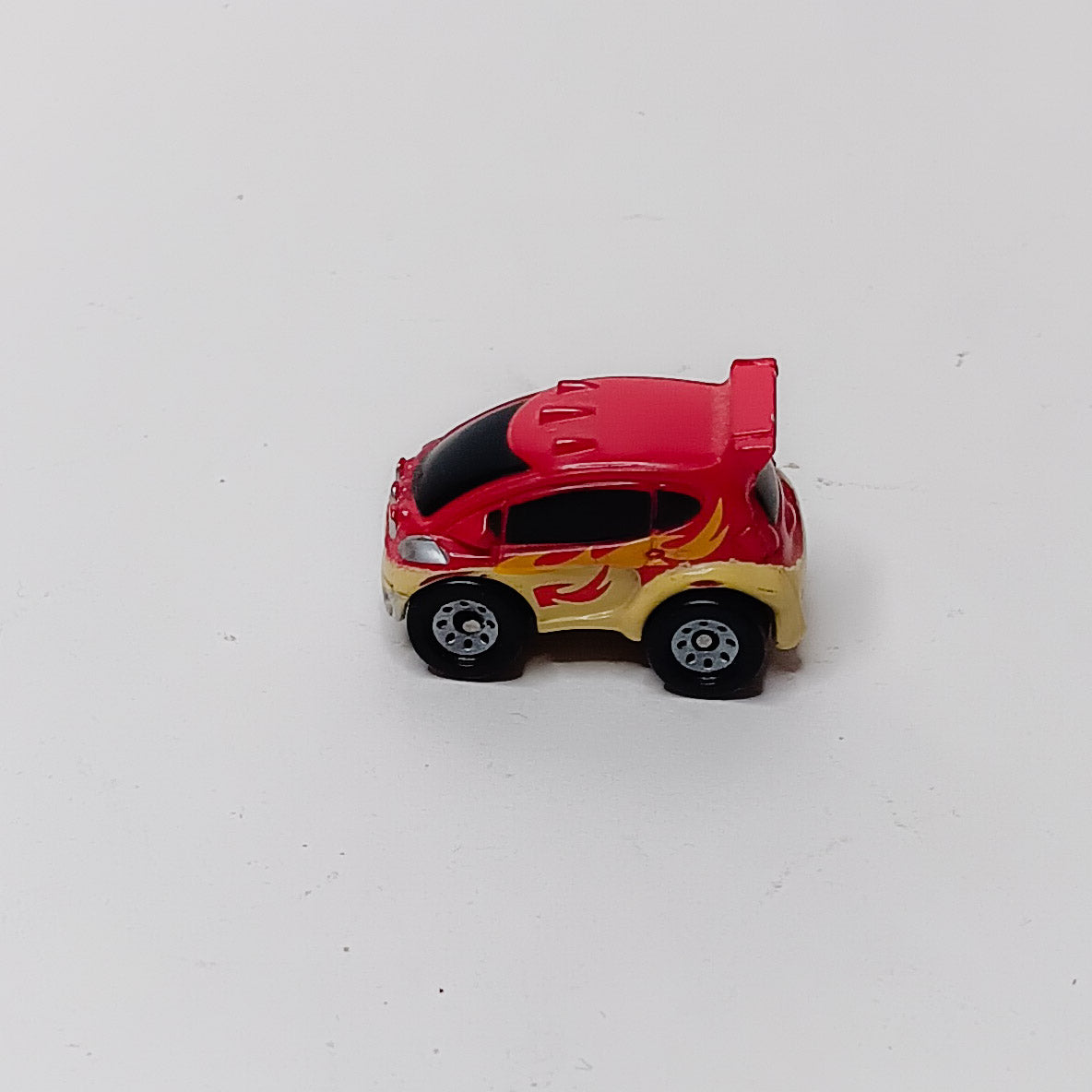 Small Hasbro Micro Machine Mini SUV in Red with Yellow Flames