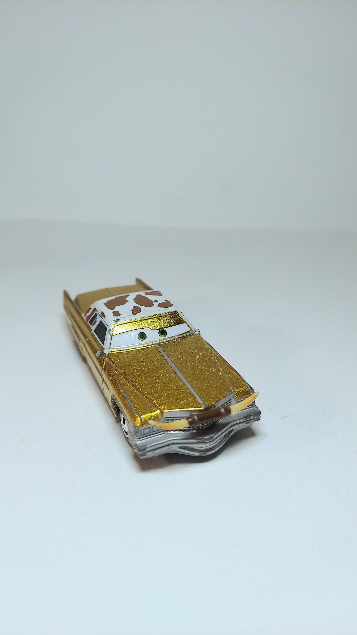 Disney Pixar Cars Tex Dinoco - 1975 Cadillac Coupe De Ville