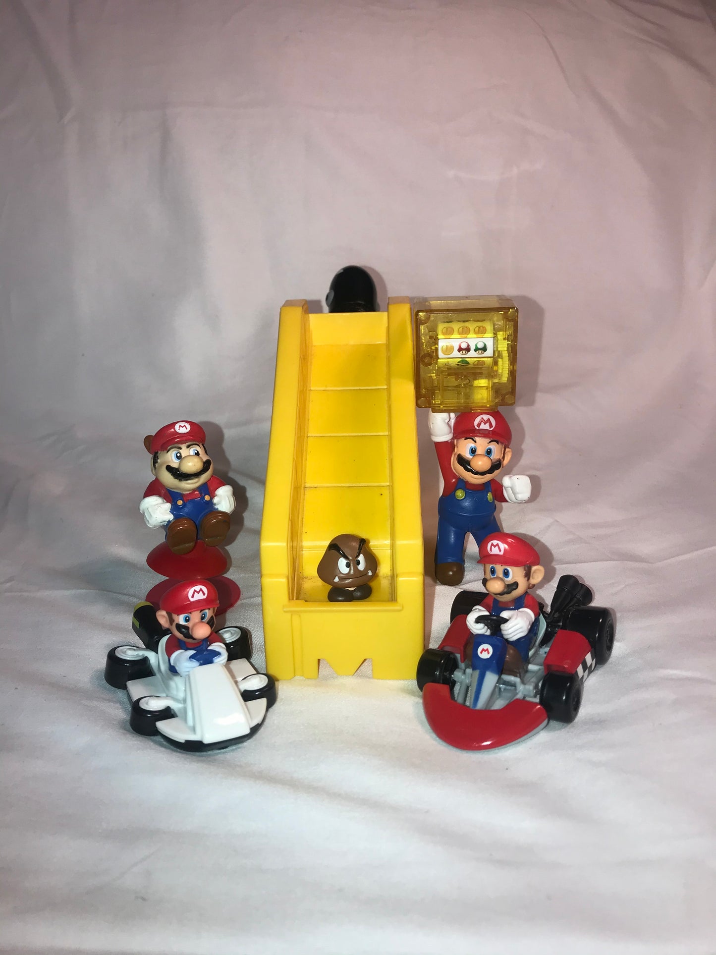 Supper Mario plastic figurine lot of six plus yellow slide