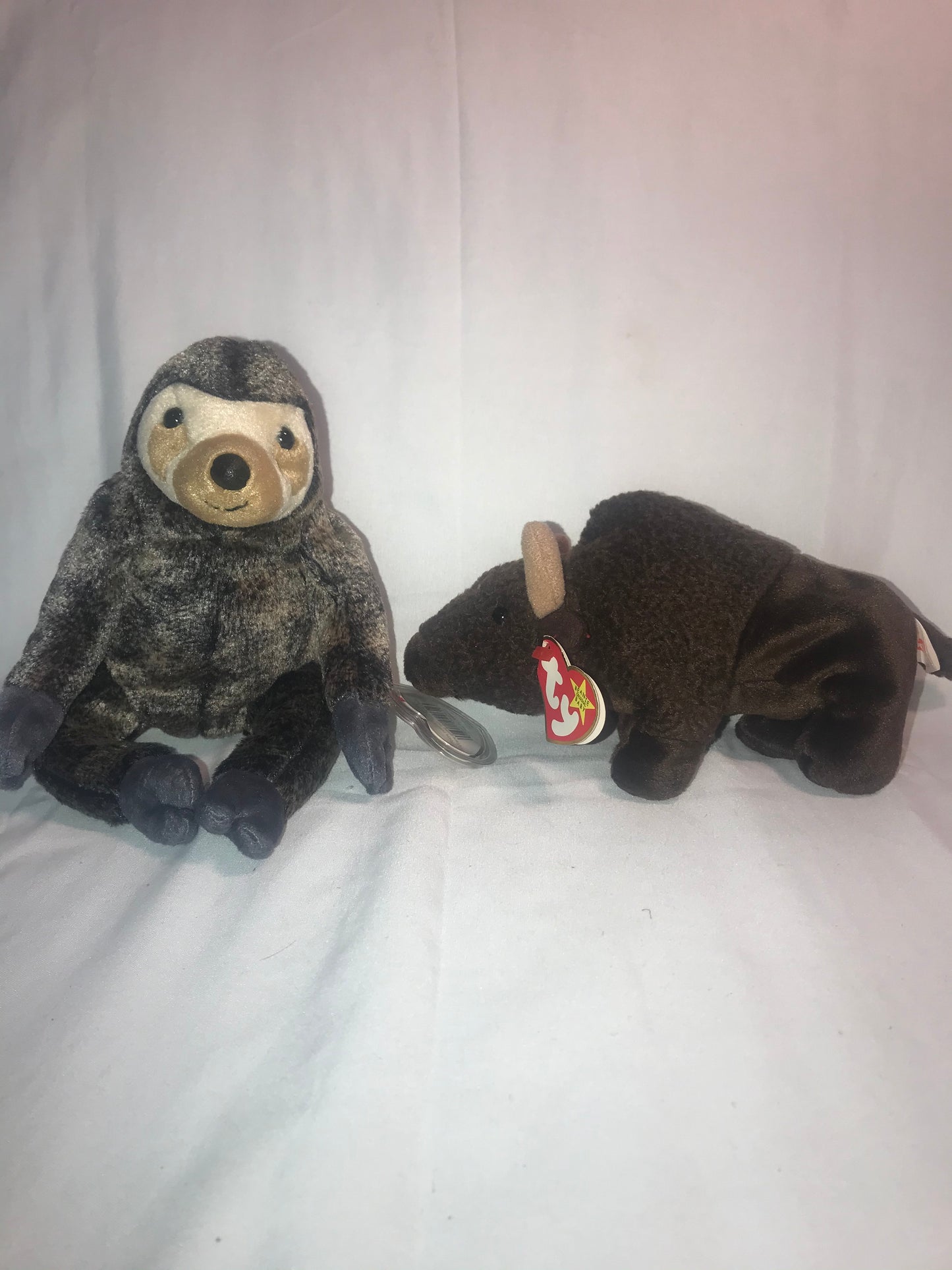 Rare Retired Ty Beanie Baby Slowpoke and “Roam” the ty Buffalo (Set of two).