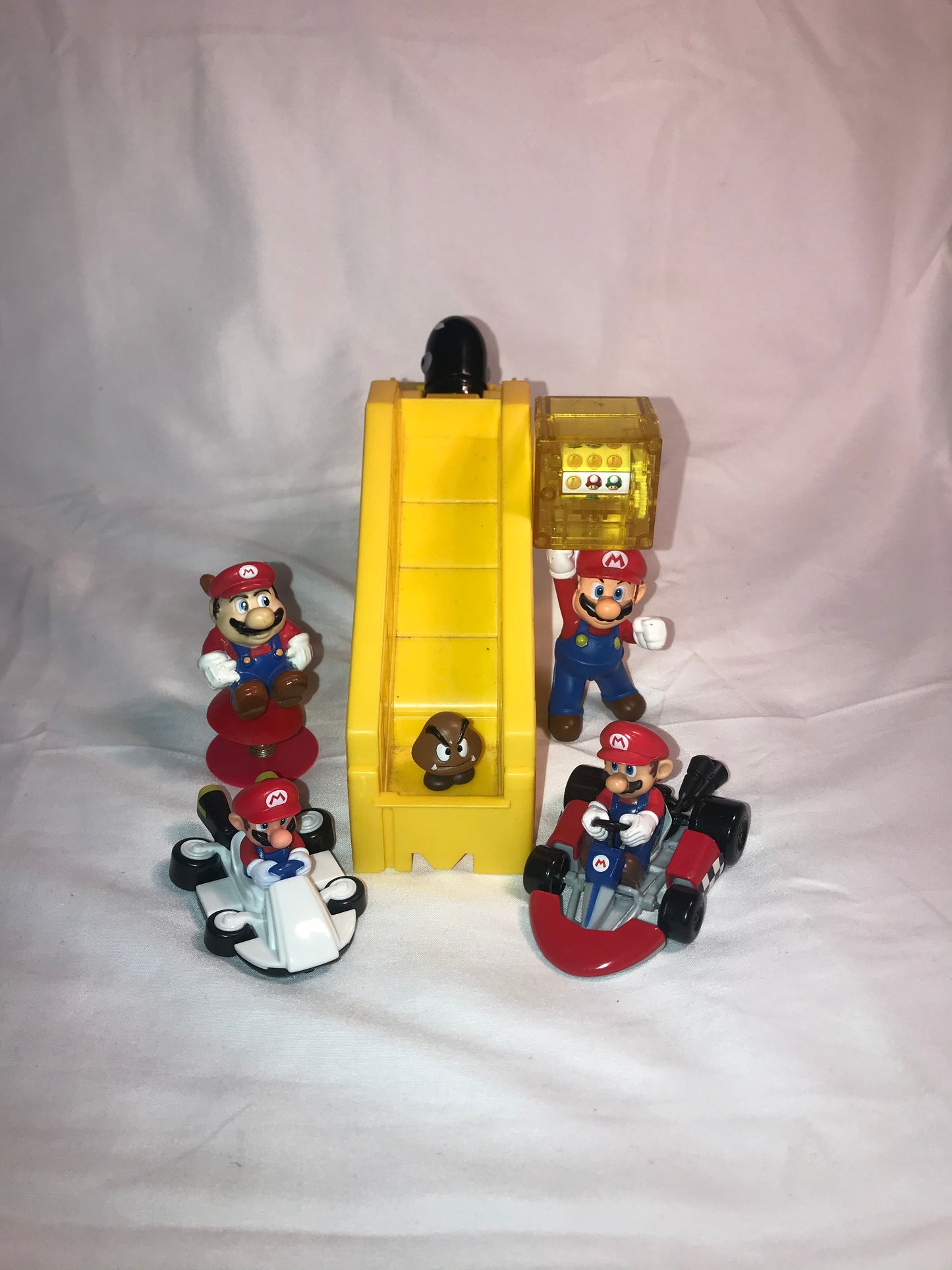 Supper Mario plastic figurine lot of six plus yellow slide