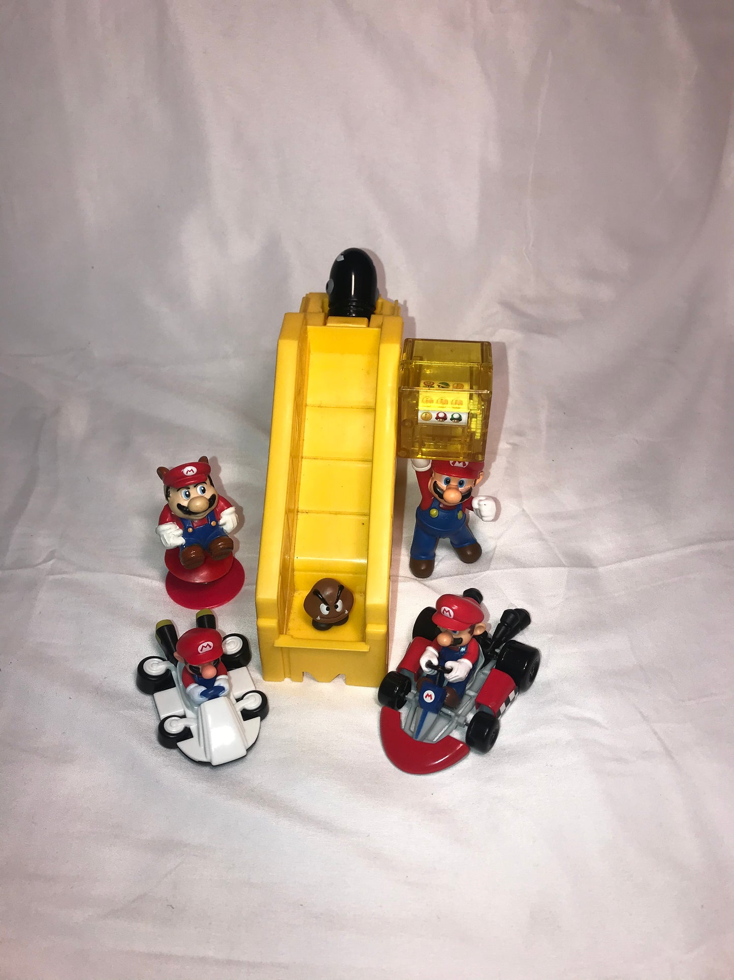 Supper Mario plastic figurine lot of six plus yellow slide